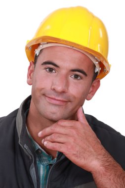 Portrait of a satisfied tradesman clipart