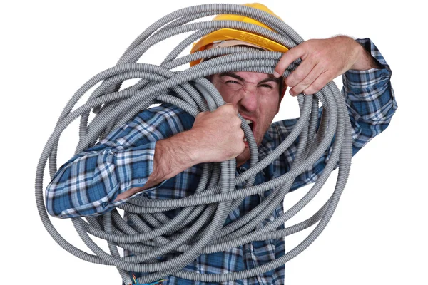 Man trassla i kabel — Stockfoto