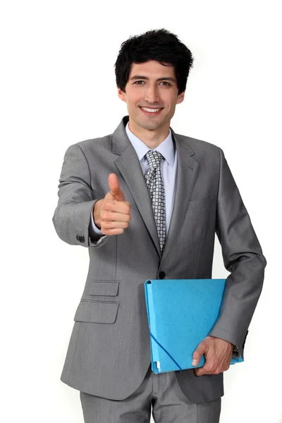 Palce nahoru z podnikatel drží složku — Stock fotografie