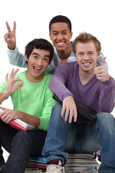 Three teenagers grimacing Stock Photo