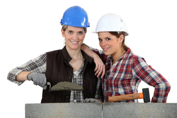 Vrouwen bouwen muur — Stockfoto