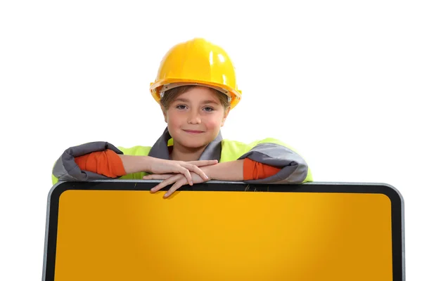 Bambina in uniforme da costruzione — Foto Stock