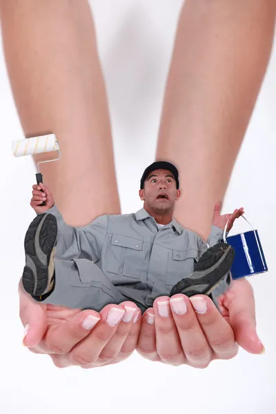 Photomontage of a man falling in hands of a woman — Stock Photo, Image