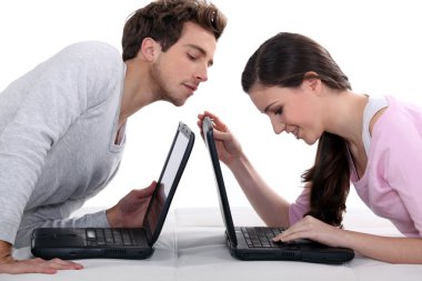 Man stealing a glance at his neighbour clipart