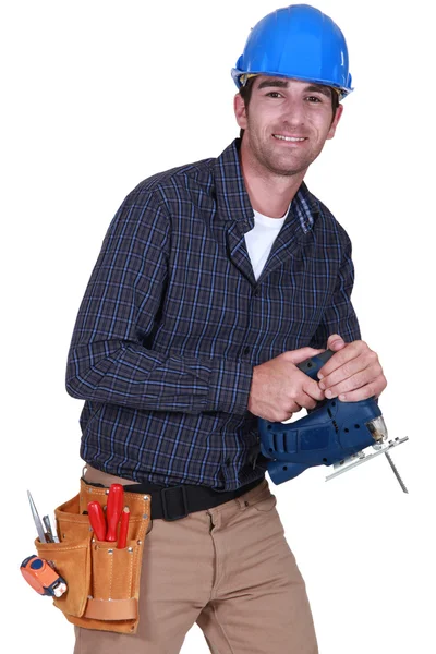 Handwerker mit einer Bohrmaschine — Stockfoto