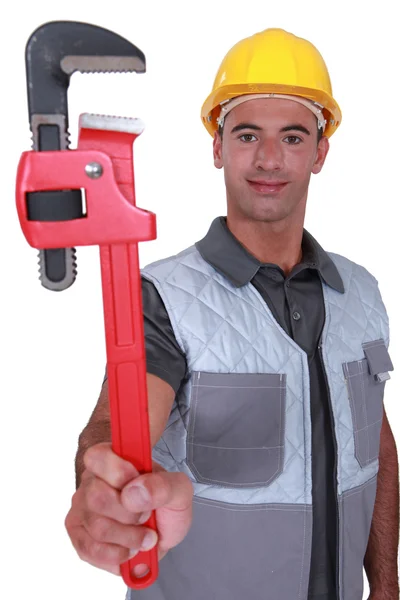 Plumber showing spanner — Stock Photo, Image