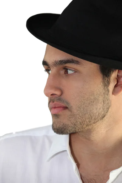 Trendy young man wearing a hat — Stock Photo, Image