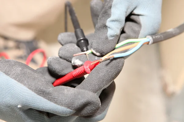 Electrician taking a reading — Stock Photo, Image