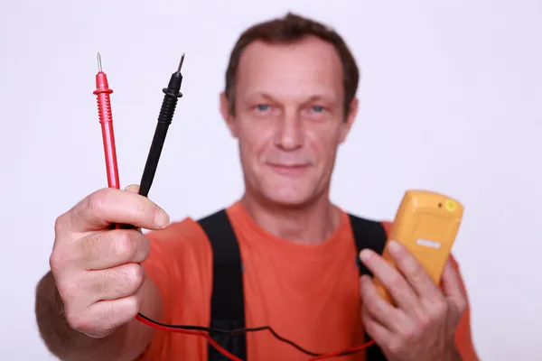 Electrician with voltmeter — Stock Photo, Image