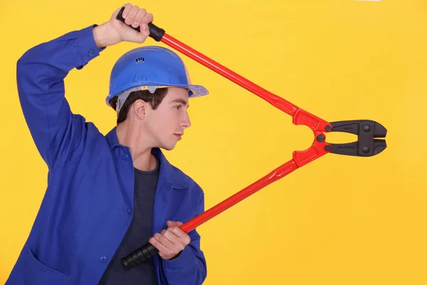 Man using bolt cutters — Stock Photo, Image