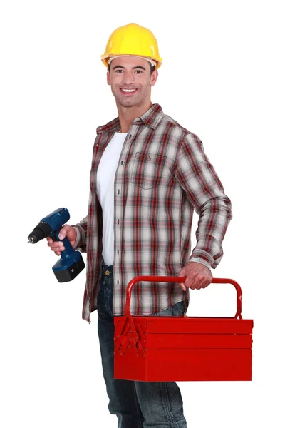 Homme avec une boîte à outils et powerdrill — Photo