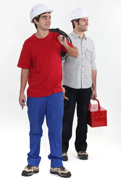 Two electricians starting job together — Stock Photo, Image