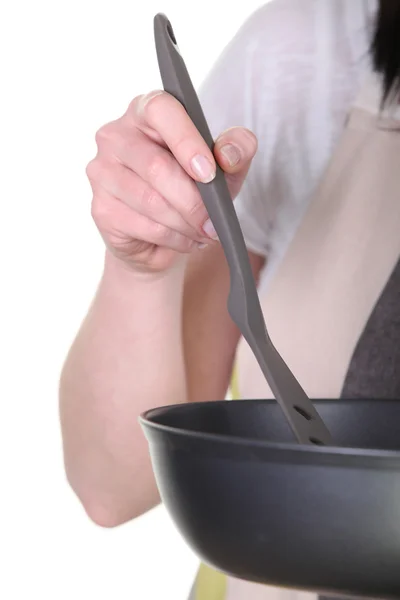 Close-up shot of a pan and spatula — Stock Photo, Image