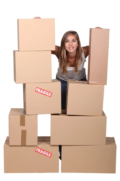 Young woman arranging her parcels — Stock Photo, Image
