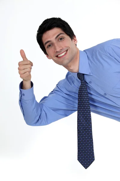 Thumbs up from a businessman Stock Photo