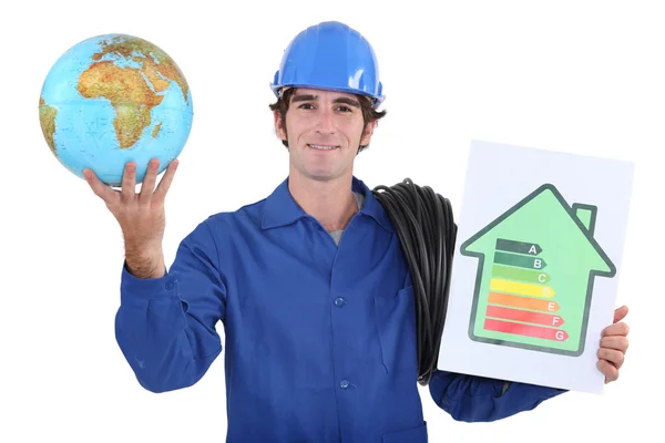 Trabajadores con globo y panel de calificación energética — Foto de Stock