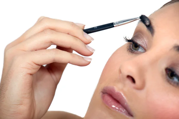 Mujer Aplicando Maquillaje —  Fotos de Stock