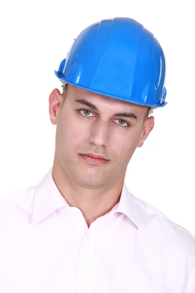 Une crinière portant un hardhat . — Photo