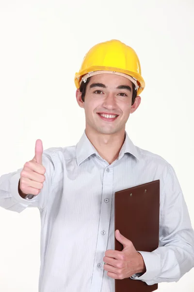 Thumbs up van een bouwer met een Klembord — Stockfoto