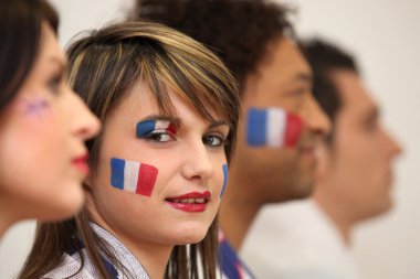 Friends watching the French team play a soccer game clipart