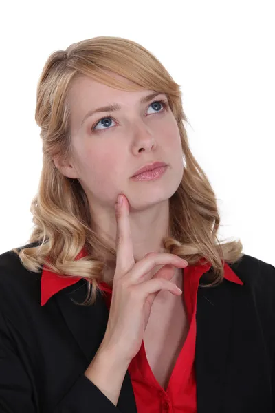 A pensive cute businesswoman. — Stock Photo, Image