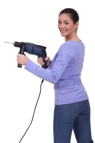 Woman with drill Stock Picture
