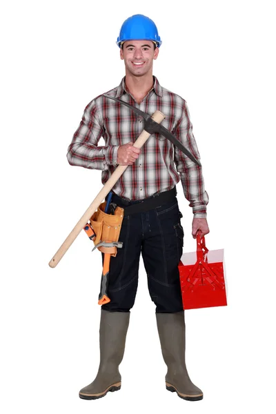 Craftsman holding a pick — Stock Photo, Image