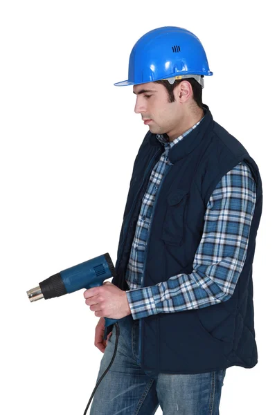 Tradesman con pistola termica — Foto Stock