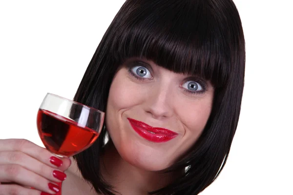 Happy brunette likes wine — Stock Photo, Image