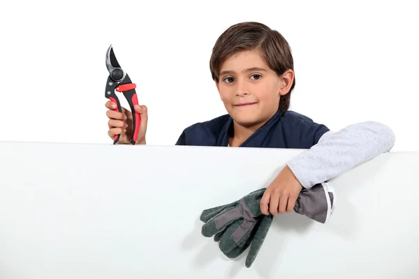 Child with pruning shears — Stock Photo, Image