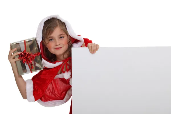 Menina vestida com roupas de Natal — Fotografia de Stock