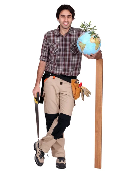 Carpenter with globe — Stock Photo, Image