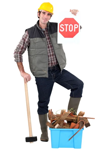 Builder with box of materials to be recycled — Stock Photo, Image