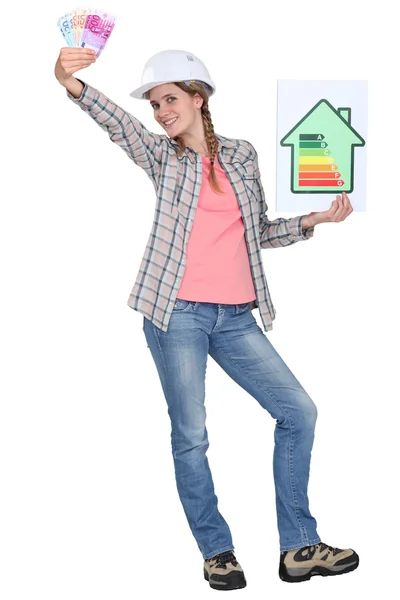 Builder with a energy rating sign — Stock Photo, Image