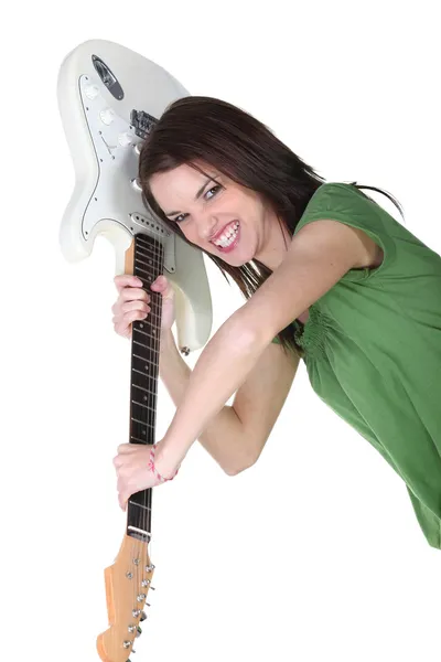 Crazy woman throwing guitar in air — Stock Photo, Image