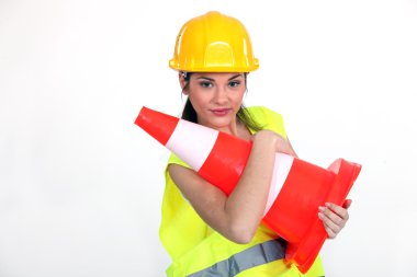 Woman with helmet and warning sign clipart