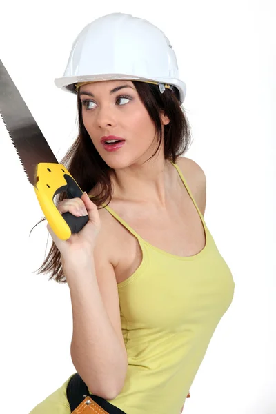 Woman with handsaw — Stock Photo, Image