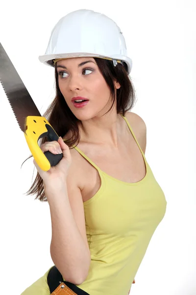 Woman with handsaw Royalty Free Stock Images