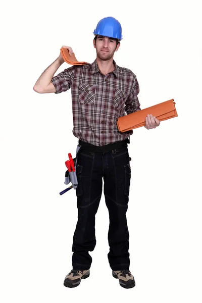 Roofer holding tiles — Stock Photo, Image