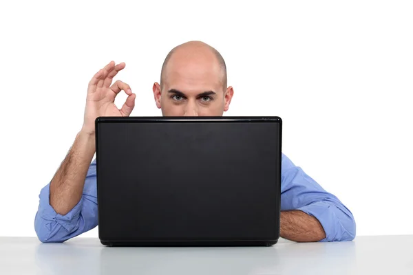 Bad man with laptop Royalty Free Stock Images