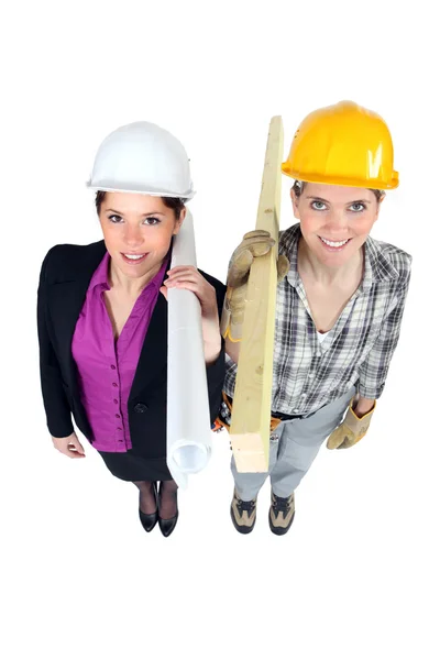 Engineer and construction worker side-by-side — Stock Photo, Image