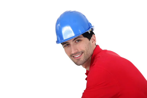 Άνθρωπος που φορώντας ένα μπλε hardhat — Φωτογραφία Αρχείου