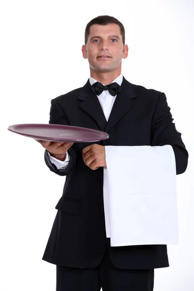 Waiter holding tray — Stock Photo, Image