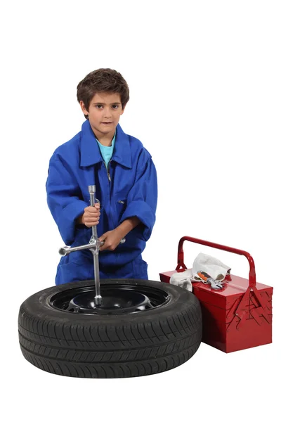 Kid dressed as mechanic — Stock Photo, Image