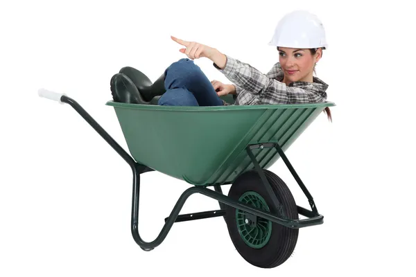 Craftswoman sitting in a barrow — Stock Photo, Image