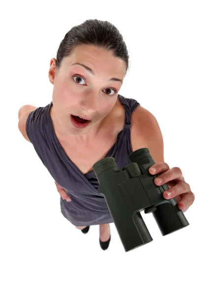 Brunette with binoculars — Stock Photo, Image