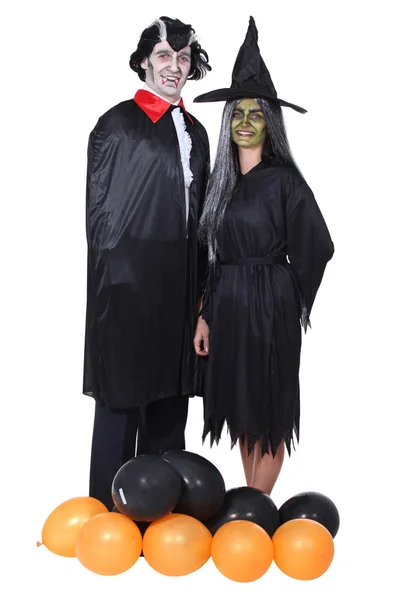 Par klädda i halloween kostymer — Stockfoto