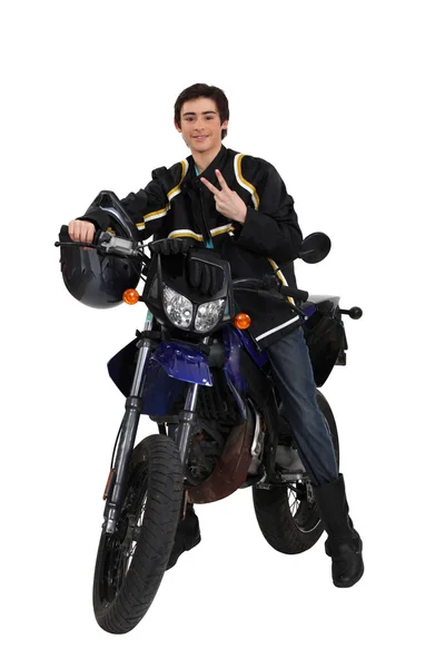 Lad on a motorbike — Stock Photo, Image