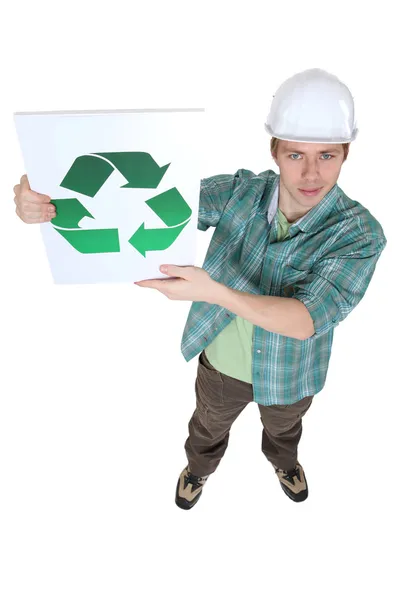 Constructeur avec un logo de recyclage — Photo