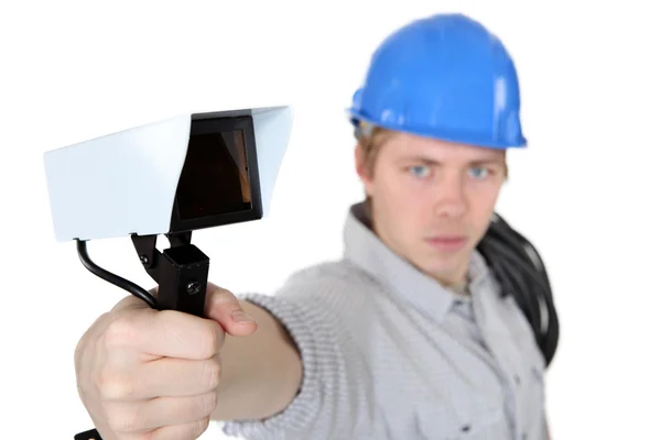 Retrato de eletricista jovem contra fundo branco — Fotografia de Stock